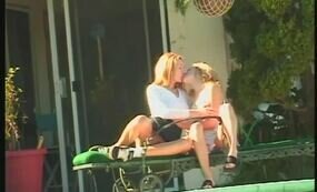 Blonde chicks licking pussies at the backyard
