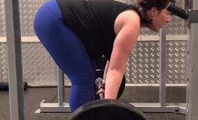 Strong girl on the gym